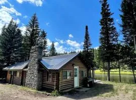 Charming Riverfront Cabin with Hot Tub and Dock Access Near Scenic Trails in Island Park, Idaho
