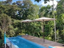 Glamping in jungle - Corcovado Nature Wonders - amazing views - available scooter，位于希门尼斯港的酒店