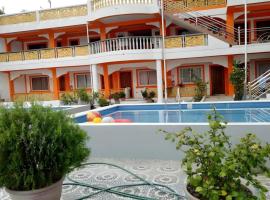 Palm Grove Saud Holiday Complex Hotel，位于拉瓦格的酒店
