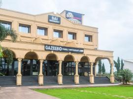 Capital O Sai Residency，位于Bere的酒店