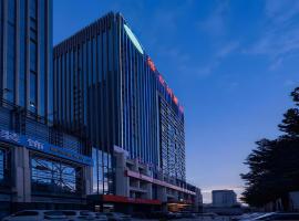 Vienna Hotel Henan Luoyang Jiudu Road Wanda，位于洛阳的酒店