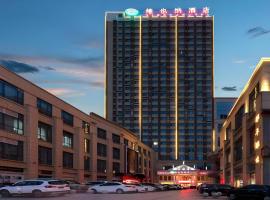 Vienna Hotel Anhui Taihe Baitai Xingma International，位于阜阳的酒店