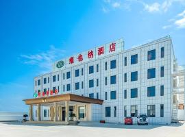 Vienna Hotel Shandong Qingdao Jiaodong International Airport Hai'er Avenue，位于Madian的酒店