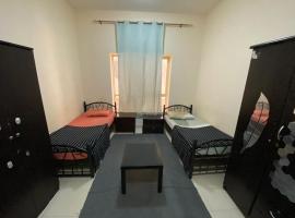 سكن شباب بالتعاون - ALEX Hostel - Sharjah，位于沙迦的酒店
