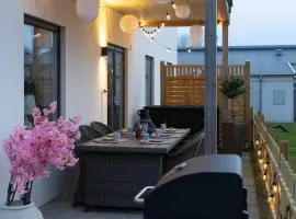 Bright Ground Floor Corner Home with Cozy Outdoor