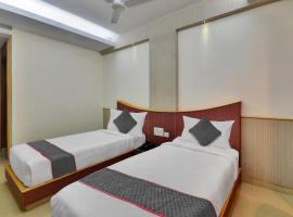Super Townhouse Coastal Grand Hotels and Resorts，位于哥印拜陀的酒店
