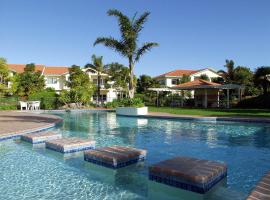 太平洋棕榈树度假酒店，位于帕帕莫阿的带泳池的酒店