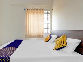 SPOT ON 78782 Hotel Om Classic，位于Sarjāpur的酒店