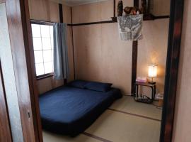 Ainu lodge，位于上川町的酒店