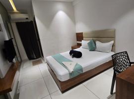 Blossom suites，位于科泽科德的酒店