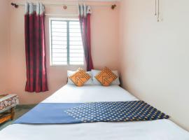 Hotel O Woodland Lodge，位于班加罗尔的酒店