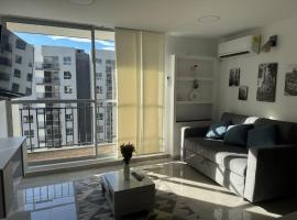 Cozy apartment in Ricaurte Famyly，位于里考尔特的酒店