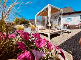 Biale Domki Paula Rewal - Domki z klimatyzacja, w obiekcie Jacuzzi i darmowe Wifi!，位于里沃的酒店