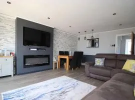 An entire two bed sea side bungalow with lazy spa