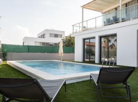 Descubre Villa Oasis - Confort, diseño y naturaleza a un paso de Valencia，位于奇瓦的酒店