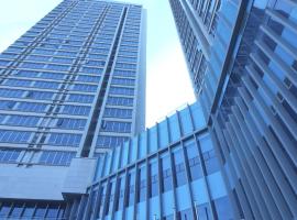 The Comfort Triny Hotel，位于龙仁市的带停车场的酒店