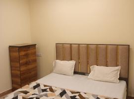 D k hotel and restauraent，位于Akbarpur的酒店