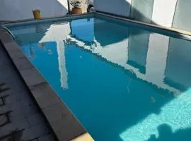 No Centro com Piscina Aquecida solar