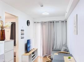 Davao 1BR Condo for 4 with Pool Near SM Lanang and Airport，位于达沃市的酒店