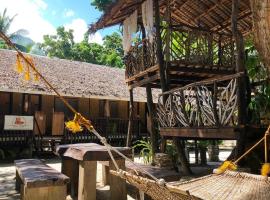 Amami Beachfront Bungalows & Villa，位于波尔多·格尼拉的酒店