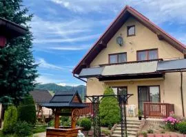 Dom całoroczny w Dębnie Podhalańskim z widokiem na Tatry i Gorce