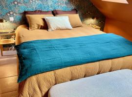 Parenthèse sous les toits - suite cosy avec jacuzzi - hypercentre，位于欧塞尔的酒店