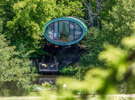 AKIS namelis medyje- Dinosaur Park，位于Radailiai的Spa酒店