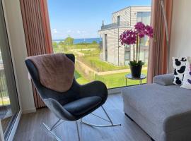 BeltBlick Fehmarn - moderne Ferienwohnung mit Meerblick und Sauna - Neubau，位于费马恩的酒店