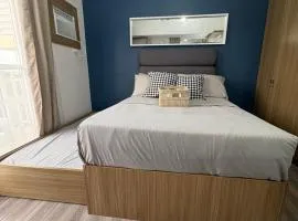 Amani 311 Suites - Double bed with Single Pull Out Bed