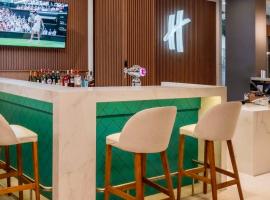 罗萨里奥假日酒店，位于罗萨里奥的酒店