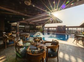 فندق الترحيب Atarheeb Hotel，位于泰布克的带泳池的酒店