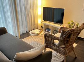 Modern apartment Pilatus view self check-in，位于施坦斯的酒店