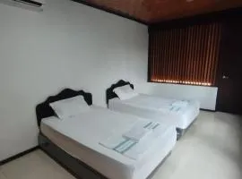 Logbond Cozy Guesthouse