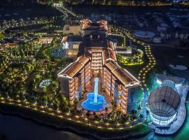 琼海官塘假日度假酒店（尊享无限次温泉体验），位于琼海的酒店