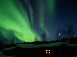 Villa Tolonen a beautiful log villa by the Ivalo River，位于伊瓦洛的酒店