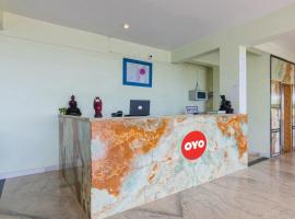 Capital O The Great Ocean View，位于曼德姆的酒店