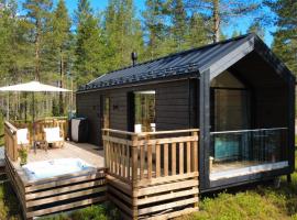 Hossaville Luxe West Lake Cabin，位于霍萨的木屋