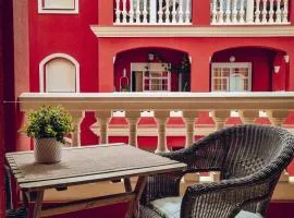 Apartamento rojo con vistas al mar