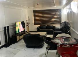 Golden tulip apartment，位于Amuwo的酒店