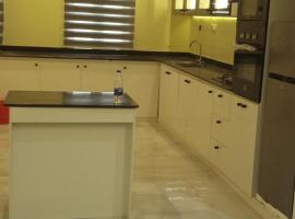 Blossom Service Apartment，位于Olowoira的酒店
