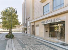 迪瓦尼拉里萨宫殿酒店，位于拉里萨的酒店