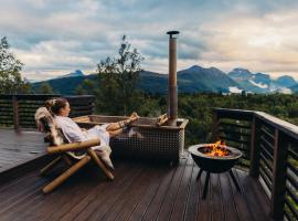 Dream Cabin Mivo X - Mountain Views and Idyllic Location at Strandafjellet，位于斯特兰达的酒店