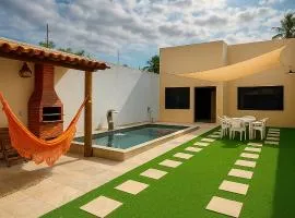 Casa Climatizada com Piscina e Área de Churrasco 400B