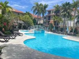 2 Zimmerwohnung, offene Küche und grosser Wohnbereich mit Poolblick in Cabarete wenige Schritte vom Meer