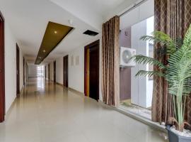 Townhouse OAK Central Suits，位于科泽科德科泽科德国际机场 - CCJ附近的酒店