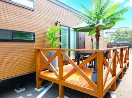 ホテルトレーラーシップガーデン阿蘇，位于阿苏市的酒店