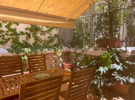 Cozy 1-Bedroom Apartment with Garden Patio, 2 min to Metro, Central Athens