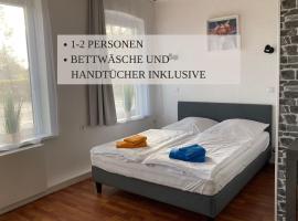 Haus Krabbe Zimmer ohne Küche, zentral gelegen zwischen Cuxhaven und Bremerhaven, Unterstellmöglichkeit für Fahrräder und E-Bikes, hauseigener Parkplatz, Hunde kostenfrei willkommen，位于弗雷门的酒店