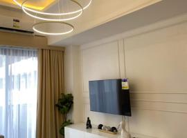 Cozy 1 bedroom at BE Residences Condominium with balcony near IT Park，位于塔博克的酒店