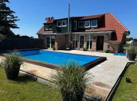 Huus ant Diek, Luxus in Deichnähe, Erdgeschosswohnung mit Pool